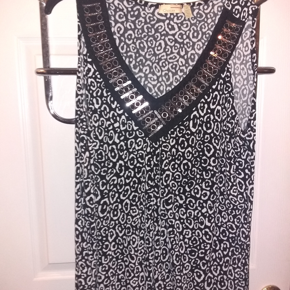 Short sleeve silk material shirt.